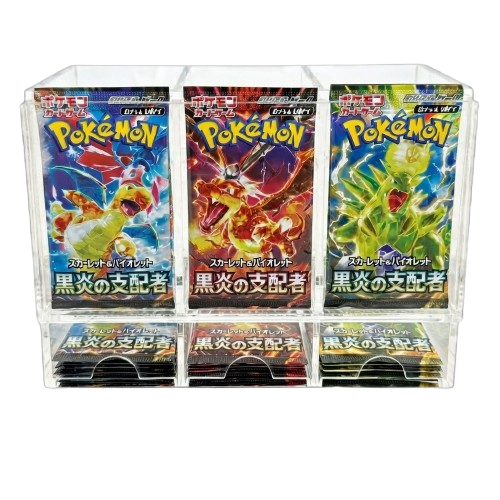 Clear three-column countertop dispenser displaying Japanese Pokémon booster packs